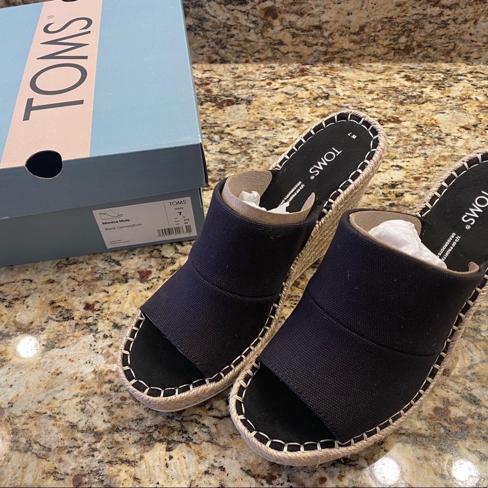 Tom’s Monica Mule, canvas material in black.  New in box, never worn